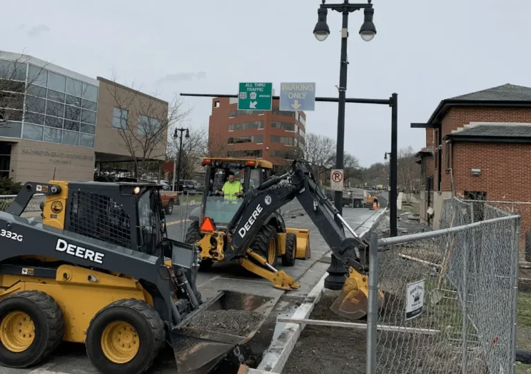 Existing sidewalk and curb removal in preparation for new sidewalk and curbing