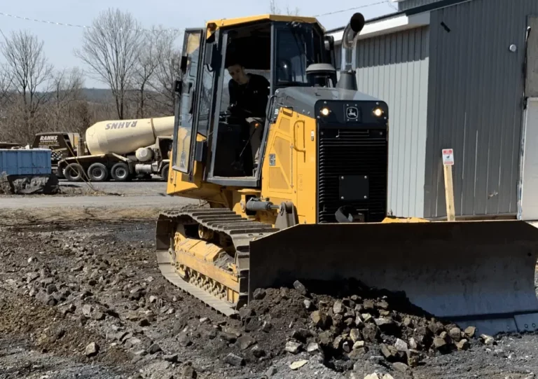 Asphalt removal and grading in preparation of new roadway and parking lot